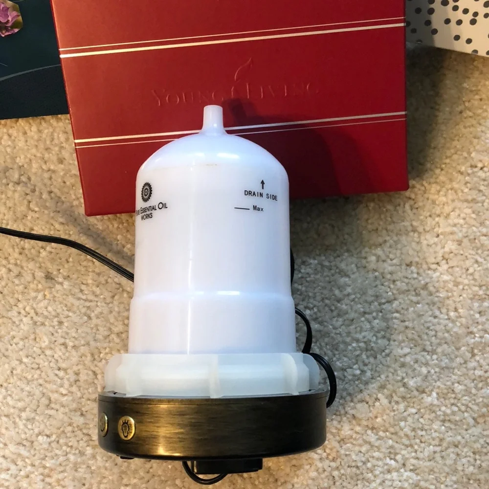Young Living essential oil bronze diffuser lights